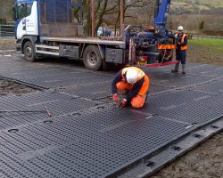 Tufftrak Heavy Duty Ground Protection Mat Connected Together To Form A Roadway