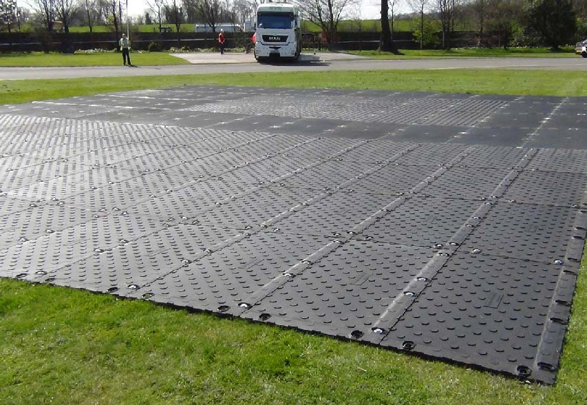 Heavy Duty man-handleable ground protection and temporary roadway or carpark mat