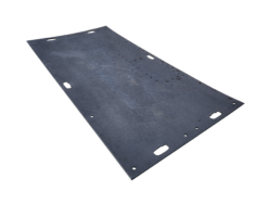 A Large, Rectangular, Flat Piece Of Dark-colored Metal With Several Holes And Slots Distributed Along Its Edges, Set Against A Plain Black Background. The Surface Has Visible Markings And Slight Signs Of Wear And Tear, Much Like The Durability Seen In ProtectaMats.